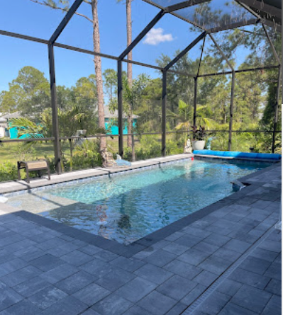 Screened pool enclosure on sunny day